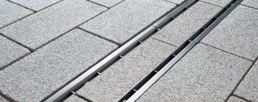 Self-Design Complete the Look grating installed in paving
