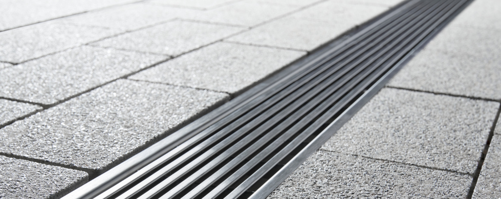 Wedge Wire in Stainless Steel Complete the Look Grating installed in paving